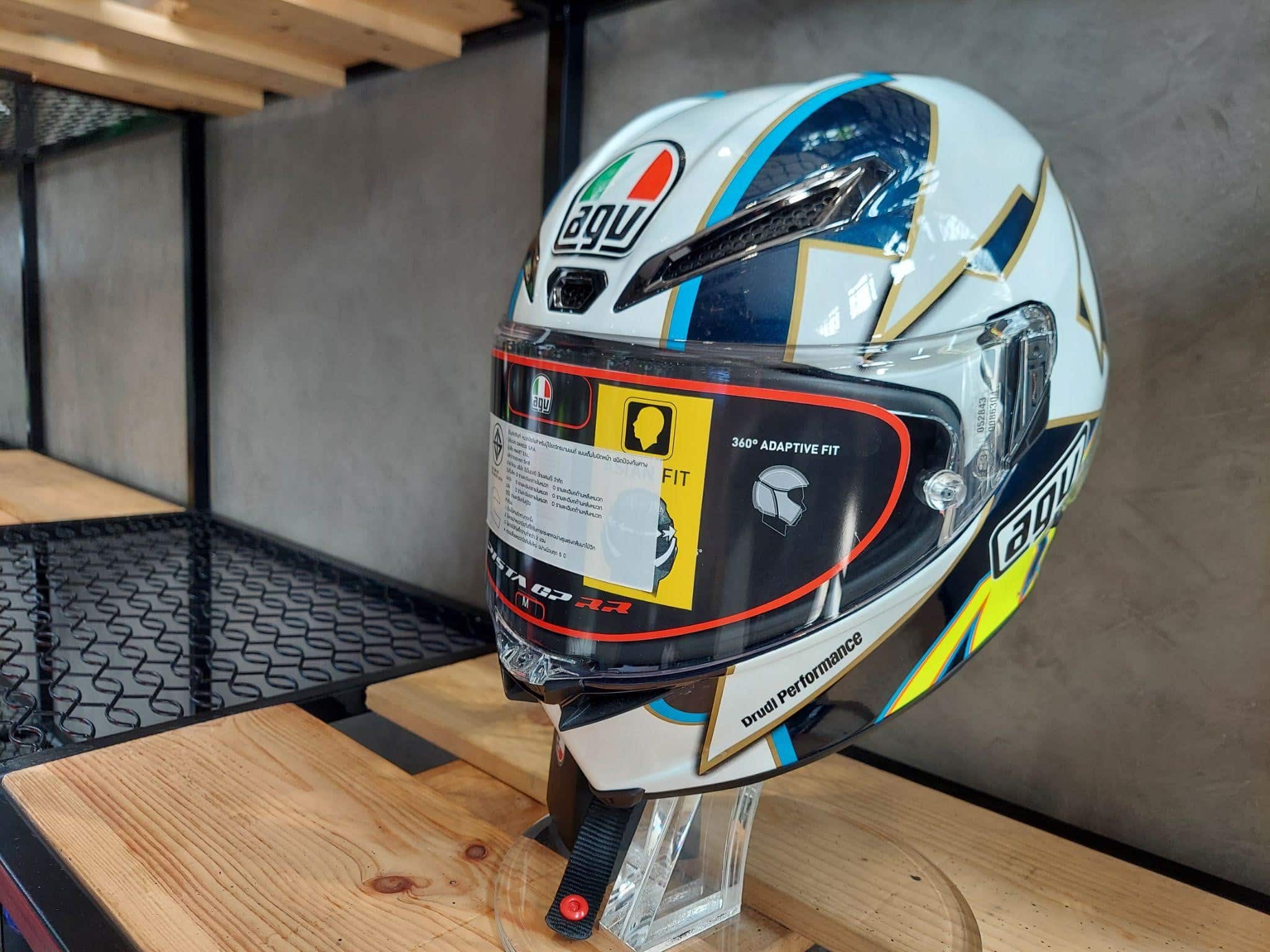 On display is the new AGV K1 helmet, showcasing its aerodynamic shape and ventilation scheme. Notably, it features a spoiler at the back, developed through wind tunnel testing for the Corsa R and Pista GP R models. Photo by Michael Parrotte.