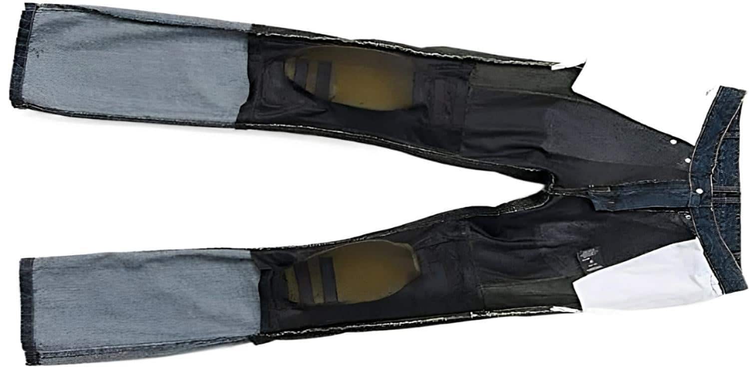 An armored pair of AGVSPORT 8000 Motorcycle Jean. It may look like ordinary jeans to the layman, but the fabric is a mix of high tensile materials, including mesh, and denim while the inside reveals that there is more to it than meets the eye. EN 1621-1 CE armor typically goes to the knee, hip and thigh areas, which are the most likely contact points if you should dump the bike.