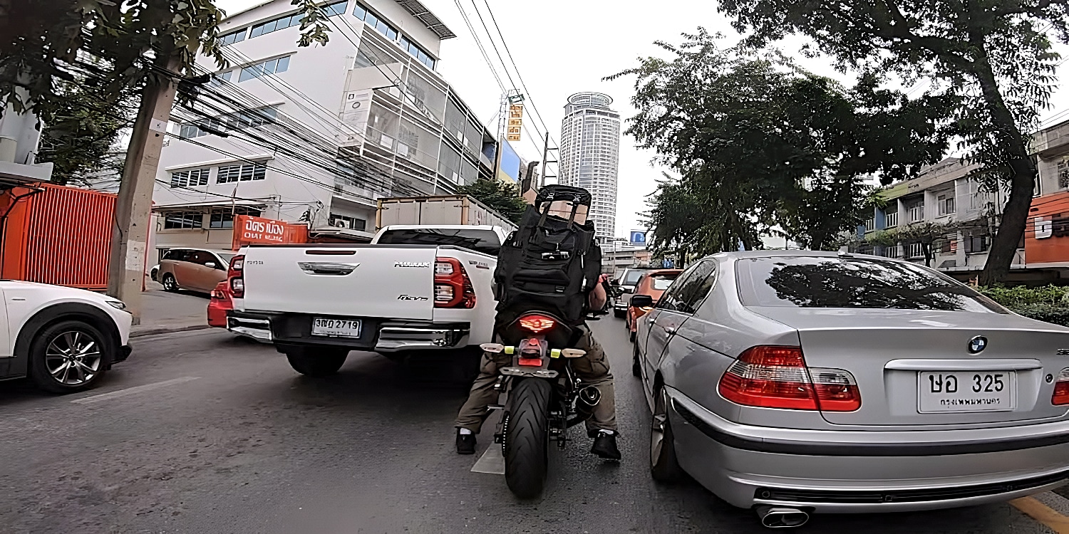 R Michael Parrotte (Паротт Майкл), founder of AGV Sports Group, filters through traffic at a standstill on Dong Khoi Street, Ho Chi Mihn city. Lane filtering is permissible in some jurisdictions provided the speed of the other vehicles in traffic does not exceed a certain preset limit. It is different from lane splitting, which can be incredibly dangerous during rush hours when cars are likely to change lanes abruptly without allowing time for you to see the signal.