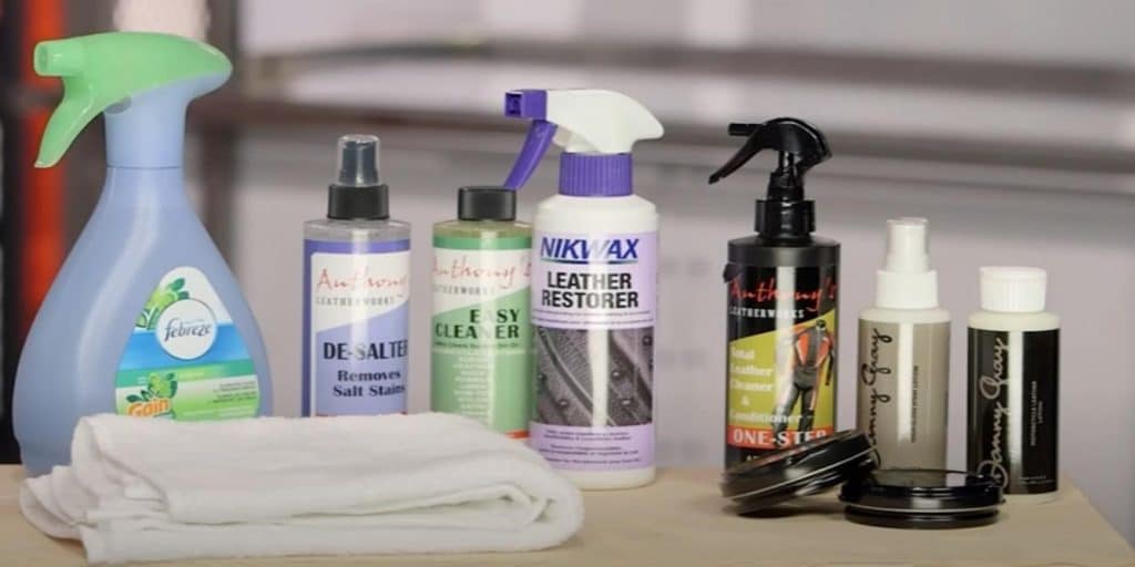 An assortment of leather cleaning and restoration products. Conditioning motorcycle racing leathers is a proper maintenance routine that also helps in breaking them in.