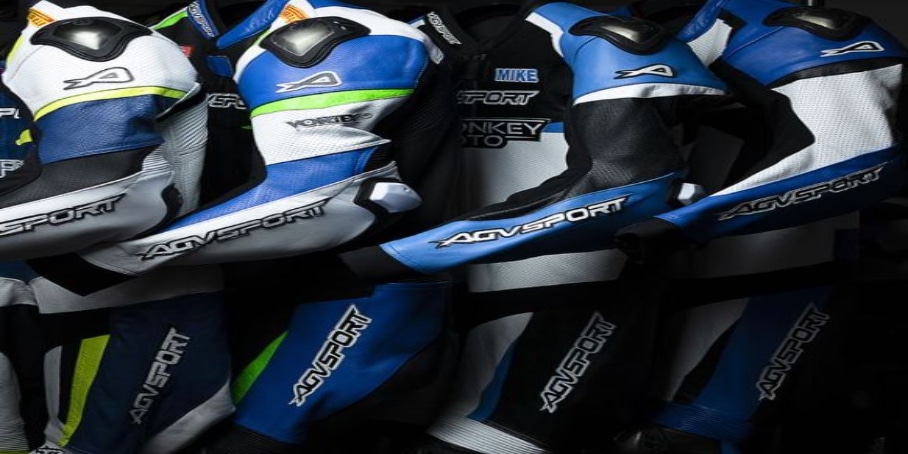 Racer closet goals featuring an impressive collection of racing suits that includes the AGVSPORT Monza-R Custom Suit, expertly fitted with state-of-the-art titanium armor and CE-approved EN1621 Level 2 soft-armor for ultimate protection in the shoulders, back, elbows, and knee/shin.