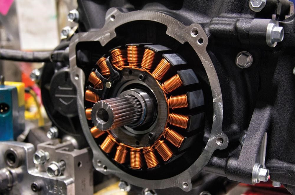 An alternator stator in the final mounting position inside its crankcase. In this design, the rotor rotates on the outside of the coil.
