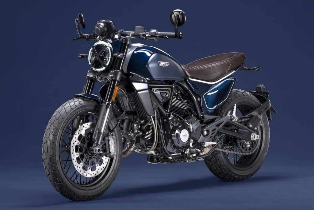 The OEM version of the new Ducati Scrambler Nightshift in nebula blue, black and a brown leather seat.