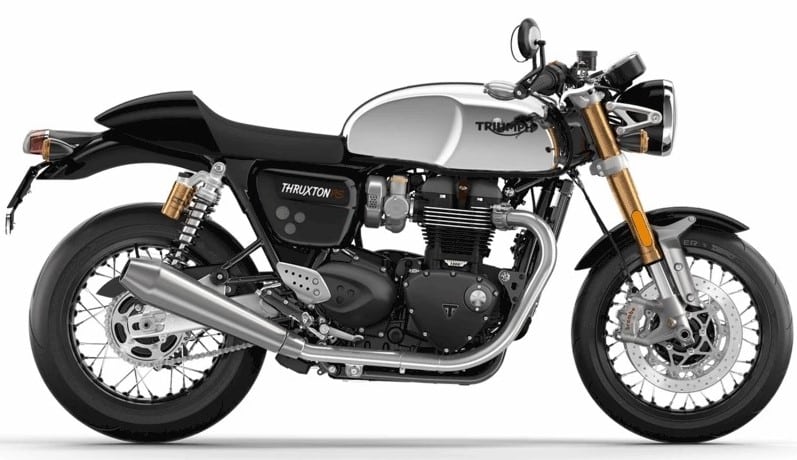 A gray and black Triumph Thruxton RS Cafe Racer sporting a 1,200 cc high-power parallel tin and premium Brembo M50 brakes.