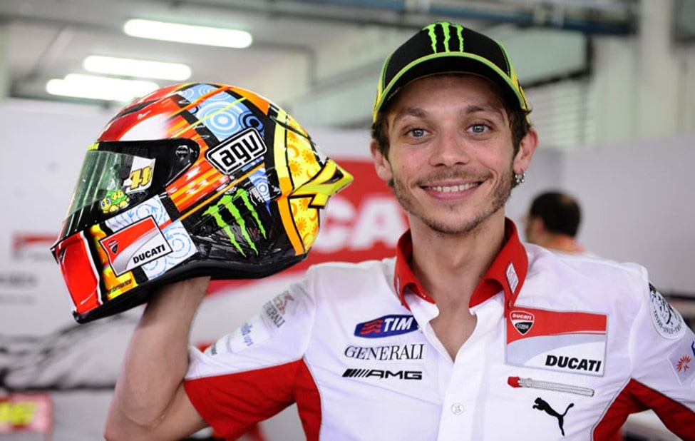 Valentino Rossi is at it again, displaying his hand designed AGV Pista GP R helmet.