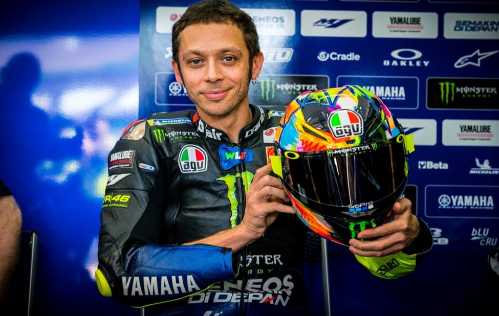 Valentino Rossi, a seven-time MotoGP champion, proudly displays his personally designed AGV Pista GP R helmet.