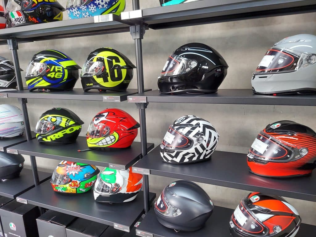 An array of AGV Graphics helmets on display at the AGV store in Bangkok, Thailand. These helmets are designed to enhance your visibility on the road while making a fashion statement.