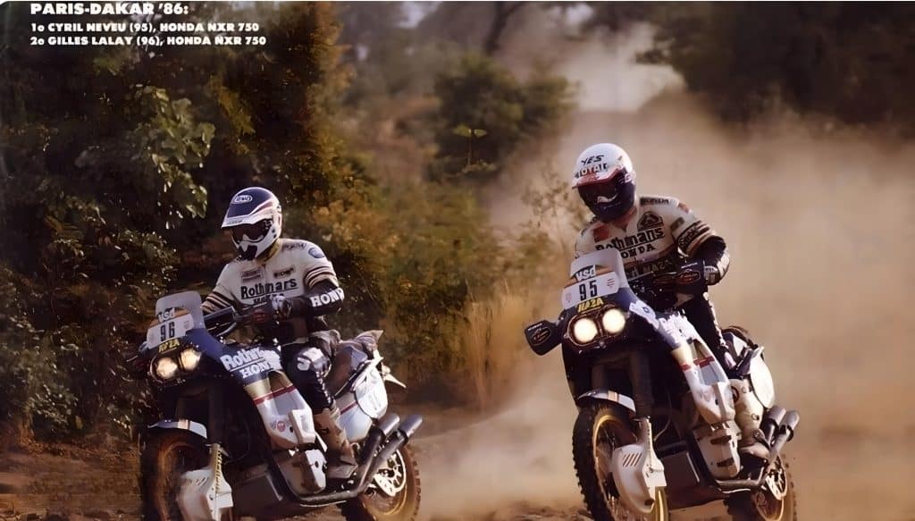 Gilley's Laylay (left) and Cyril Neveu, both on Honda NXR 750 motorcycles, during the Paris to Dakar Rally. The machine's robust chassis and reliable engine saw it carry Neveu to several victories and deliver much needed wins to stamp Hondas authority as an off-road racing maestro in that era.