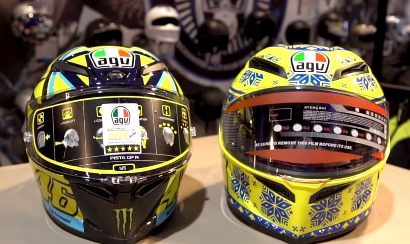On the left is the genuine AGV Pista GP R Carbon Rossi Soleluna, and on the right is its counterfeit counterpart. A quick glance reveals numerous distinctions, including one that might easily escape notice. The authentic helmet features a visor-locking mechanism upon closure, a feature noticeably absent in the fake version.