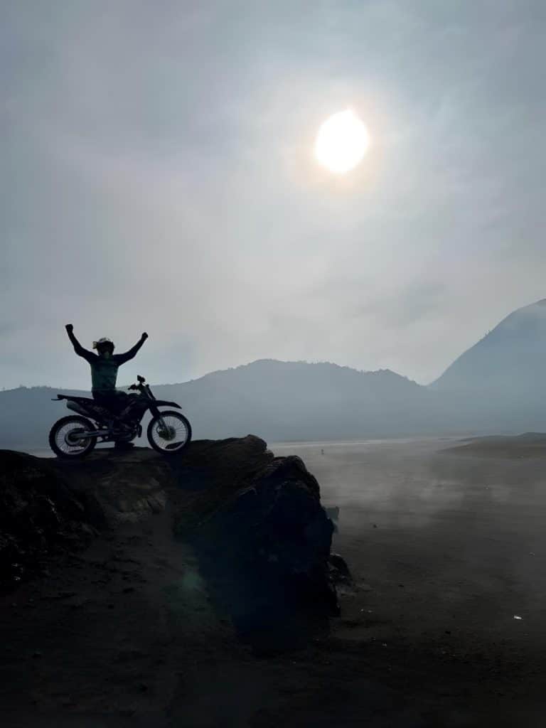 Motorcycle journey at sunrise, capturing the exhilaration of a unique adventure.