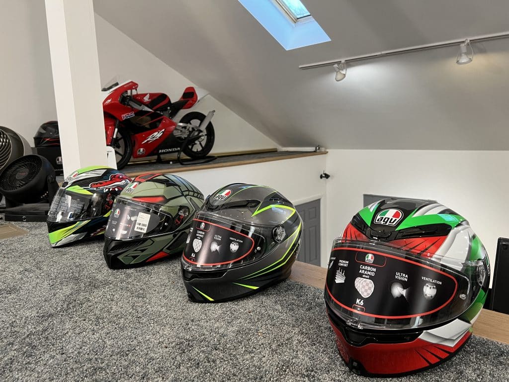 Display of AGV K1, K3 and K6 full-face helmets in my office