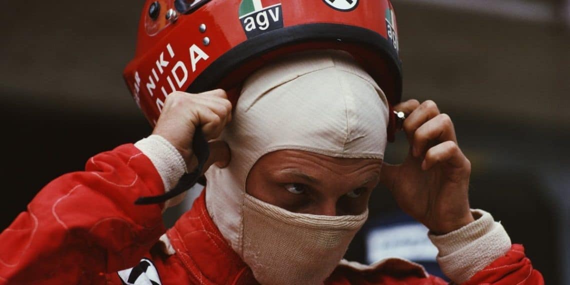 Niki Lauda Putting on His Upgraded AGV X1 Helmet Ahead of the 1977 Season