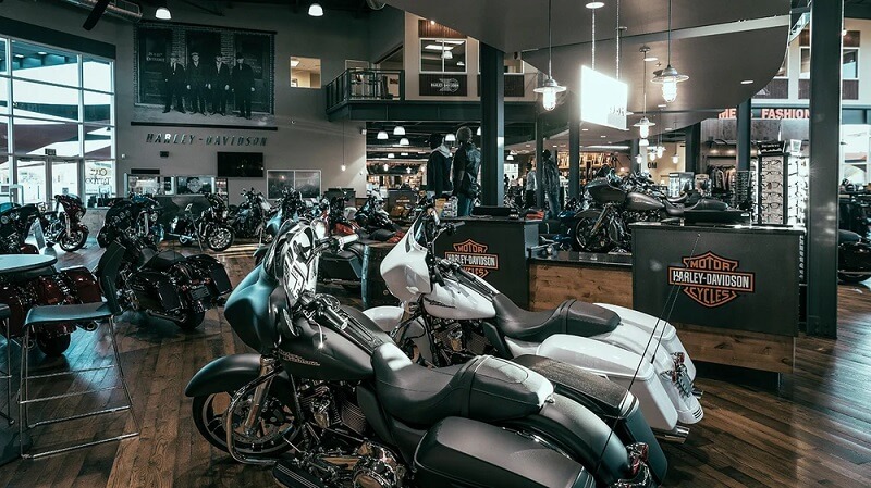 Harley-Davidson dealership showroom with rows of cruiser motorcycles illustrating U.S. big-bike market